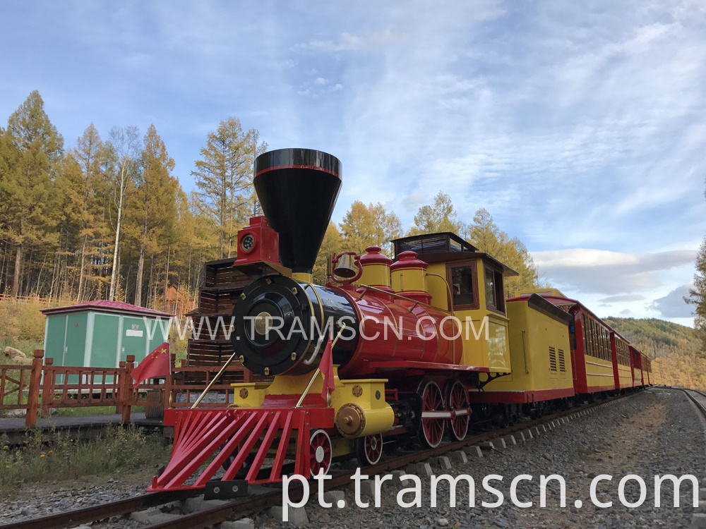 sightseeing train forest train with red and yellow colour at autumn